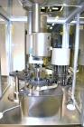 Used MG2 Futura automatic capsule filler capable of speeds up to 48,000 capsules per hour. Can run capsule sizes from 000 to 5, including tamper evident with proper changeparts. Currently haas change...