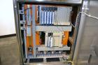 Used MG2 Futura automatic capsule filler capable of speeds up to 48,000 capsules per hour. Can run capsule sizes from 000 to 5, including tamper evident with proper changeparts. Currently haas change...