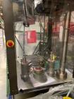 Used The Bohanan Versifil, a hard gelatin encapsulation machine designed to fill capsules at a rate of 160 to 700 capsules per minute (fill rate depends on tooling used.)