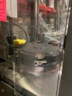 Used The Bohanan Versifil, a hard gelatin encapsulation machine designed to fill capsules at a rate of 160 to 700 capsules per minute (fill rate depends on tooling used.)