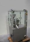 Used Zanasi AZ5 Capsule Filling/Closing Machine.  Maximum output 4,200 capsules/hour, 3/380V/60 hz, for capsule sizes 000 - 5, integrated vacuum pump and vacuum cleaner, format sets for sizes 0 / 2.