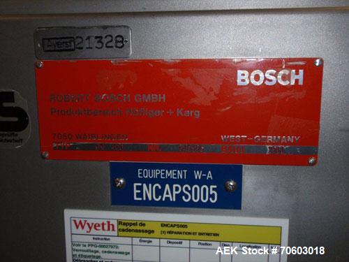 Used Bosch Encapsulator, Model GKF400. Rated up to 400 capsules per minute, serial# 640306, new 1983.