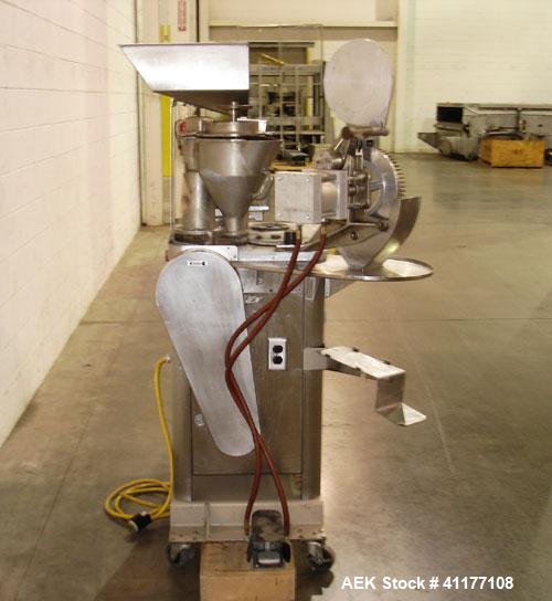 Used Capsugel Semi Automatic Capsule Filler, Model 8S. 12,000 to 15,000 capsules per hour for sizes 00 through 4 dependent upon volume per ring, operator experience and filling conditions (see Room C...