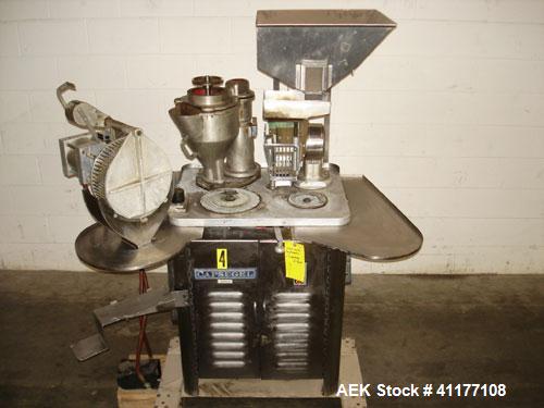 Used Capsugel Semi Automatic Capsule Filler, Model 8S. 12,000 to 15,000 capsules per hour for sizes 00 through 4 dependent upon volume per ring, operator experience and filling conditions (see Room C...