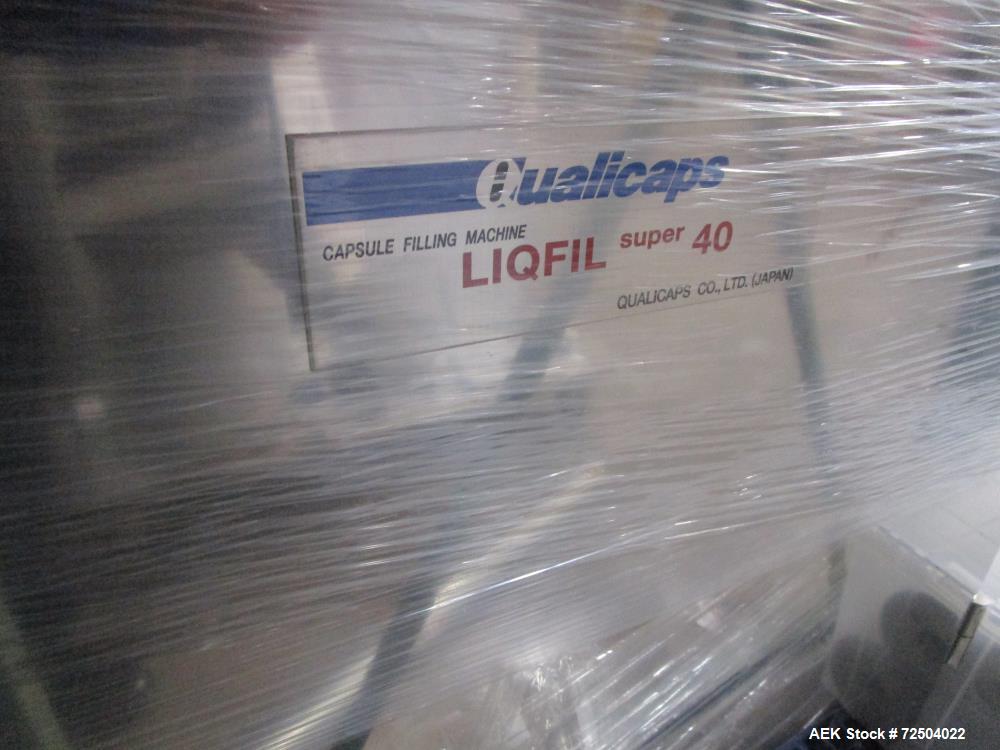 Used Qualicaps Model Liqfil Super 40 capsule filler.rated up to 40000 capsules/hour, with on board feed pump, agitated and jacketed liquid product hopper