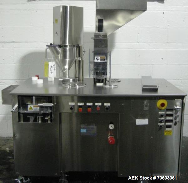 Used Capsugel Ultra 8 II Capsule Filler. Stainless steel construction, feed hopper with chute, powder fill station with agitated hopper, on stand, change parts for 00-4 capsule sizes (unit to be supp...