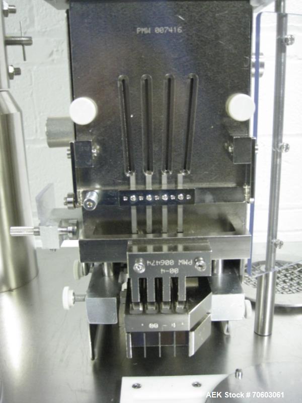 Used Capsugel Ultra 8 II Capsule Filler. Stainless steel construction, feed hopper with chute, powder fill station with agitated hopper, on stand, change parts for 00-4 capsule sizes (unit to be supp...