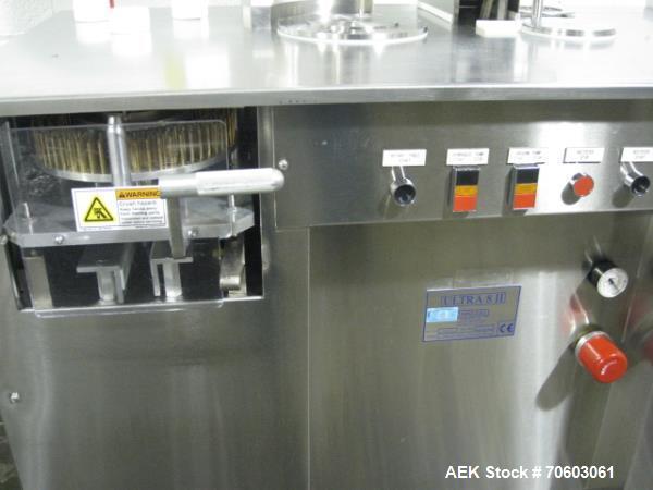 Used Capsugel Ultra 8 II Capsule Filler. Stainless steel construction, feed hopper with chute, powder fill station with agitated hopper, on stand, change parts for 00-4 capsule sizes (unit to be supp...