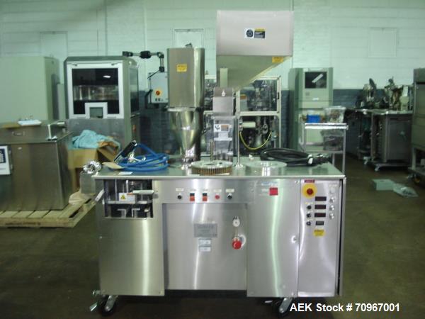 Used One (1) used Capsulgel capsule filler, model Ultra 8 II, stainless steel construction, feed hopper with chute, powder fill station with agitated hopper, on stand, serial# U-2163, new 2002. NOTE ...