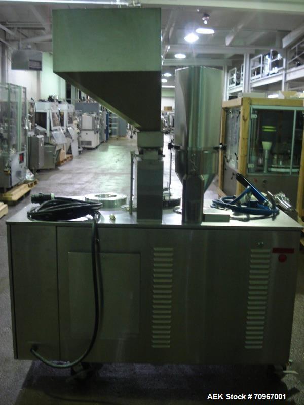 Used One (1) used Capsulgel capsule filler, model Ultra 8 II, stainless steel construction, feed hopper with chute, powder fill station with agitated hopper, on stand, serial# U-2163, new 2002. NOTE ...