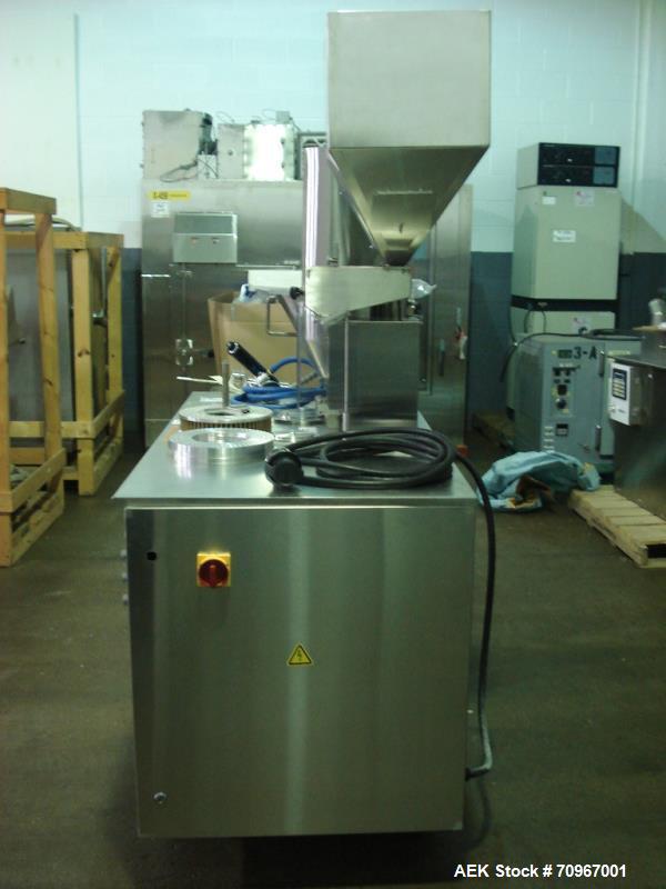 Used One (1) used Capsulgel capsule filler, model Ultra 8 II, stainless steel construction, feed hopper with chute, powder fill station with agitated hopper, on stand, serial# U-2163, new 2002. NOTE ...