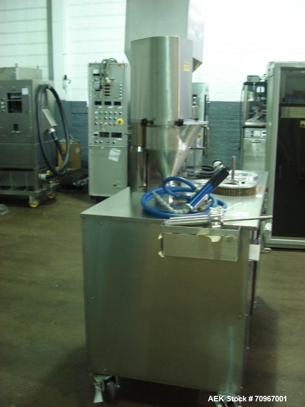 Used One (1) used Capsulgel capsule filler, model Ultra 8 II, stainless steel construction, feed hopper with chute, powder fill station with agitated hopper, on stand, serial# U-2163, new 2002. NOTE ...