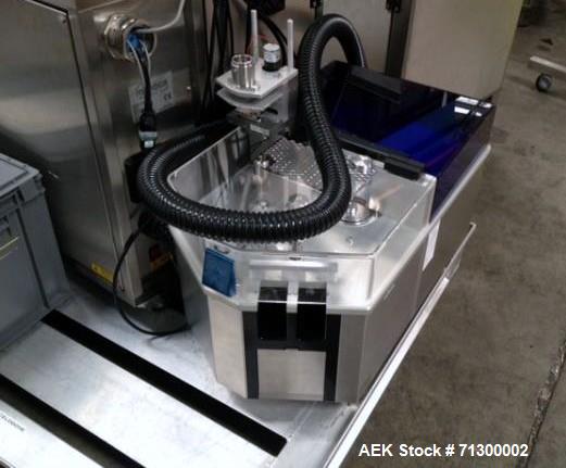 Used Capsugel Filler, Type Xcelodose 600. Stainless steel contact surfaces, rated up to 600 capsules/hour with capsule hopper, power supply 8 amps at 120 volt, 4 amps at 220 volt, ac 50/60 hertz, sin...