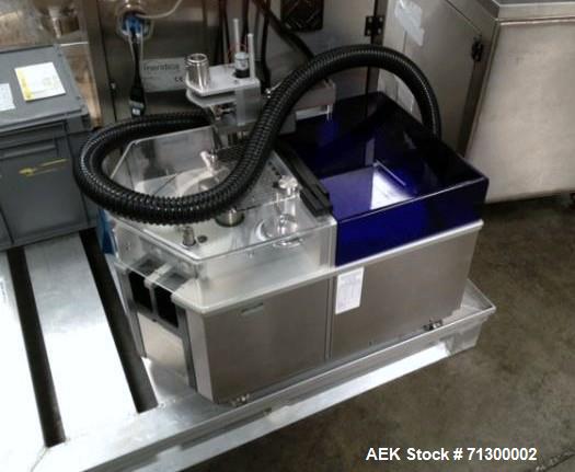 Used Capsugel Filler, Type Xcelodose 600. Stainless steel contact surfaces, rated up to 600 capsules/hour with capsule hopper, power supply 8 amps at 120 volt, 4 amps at 220 volt, ac 50/60 hertz, sin...