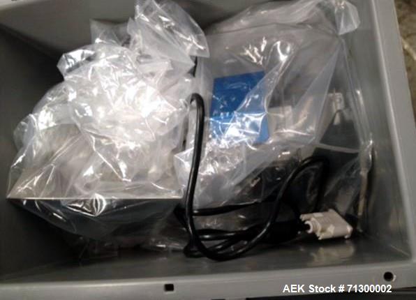 Used Capsugel Filler, Type Xcelodose 600. Stainless steel contact surfaces, rated up to 600 capsules/hour with capsule hopper, power supply 8 amps at 120 volt, 4 amps at 220 volt, ac 50/60 hertz, sin...