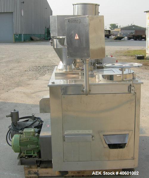 Used Anchor Mark Pharmafill High Speed Capsule Filling Machine, Model CF2. Designed to fill hard gelatin capsules with powder, granules or pellets from capsule sizes 00 to 5, currently set-up on size...