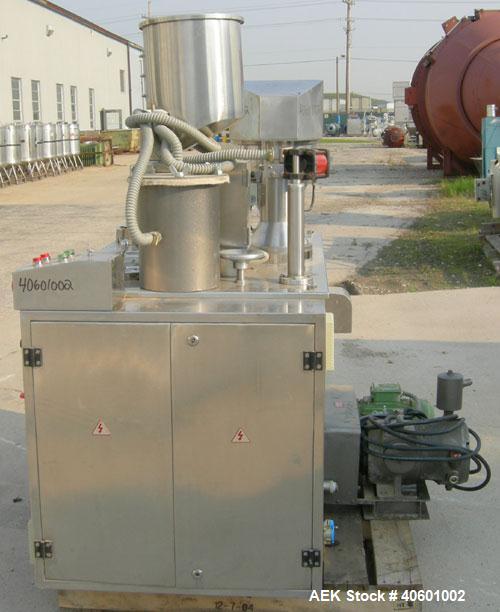 Used Anchor Mark Pharmafill High Speed Capsule Filling Machine, Model CF2. Designed to fill hard gelatin capsules with powder, granules or pellets from capsule sizes 00 to 5, currently set-up on size...