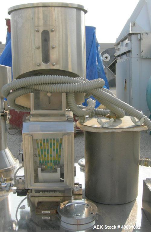 Used Anchor Mark Pharmafill High Speed Capsule Filling Machine, Model CF2. Designed to fill hard gelatin capsules with powder, granules or pellets from capsule sizes 00 to 5, currently set-up on size...