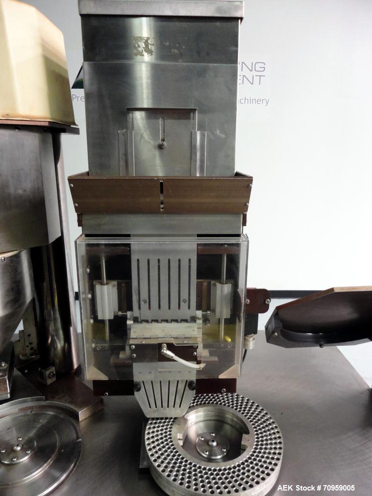 Used Shionogi Qualicaps STI Type 10 Semi-Automatic Capsule Filler. Capable of speeds up to 25,000 capsules per hour. Machine is setup with size 0 Change parts, includes a set of 00 change parts. Has ...