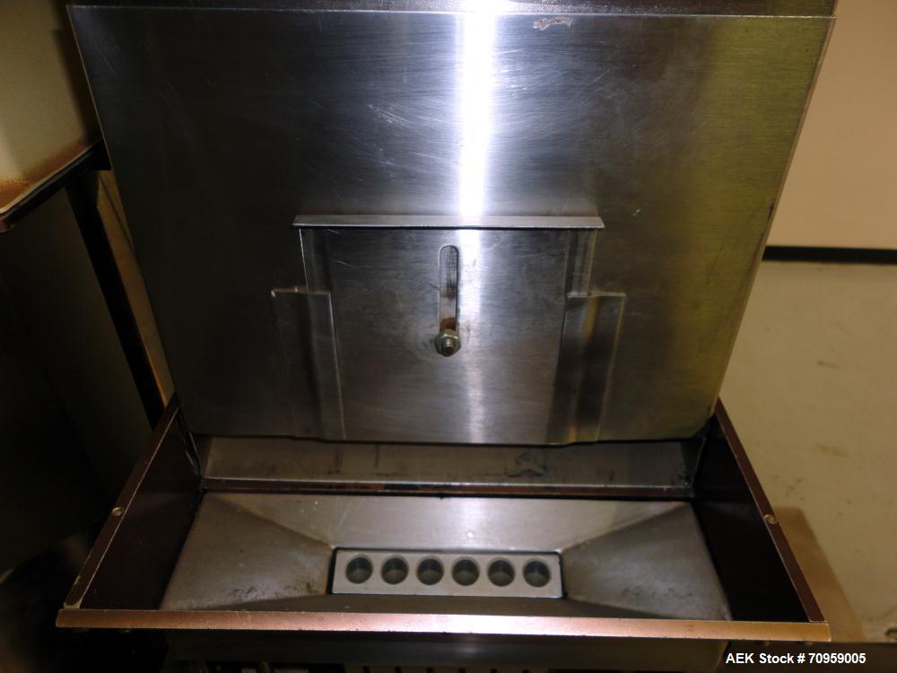 Used Shionogi Qualicaps STI Type 10 Semi-Automatic Capsule Filler. Capable of speeds up to 25,000 capsules per hour. Machine is setup with size 0 Change parts, includes a set of 00 change parts. Has ...