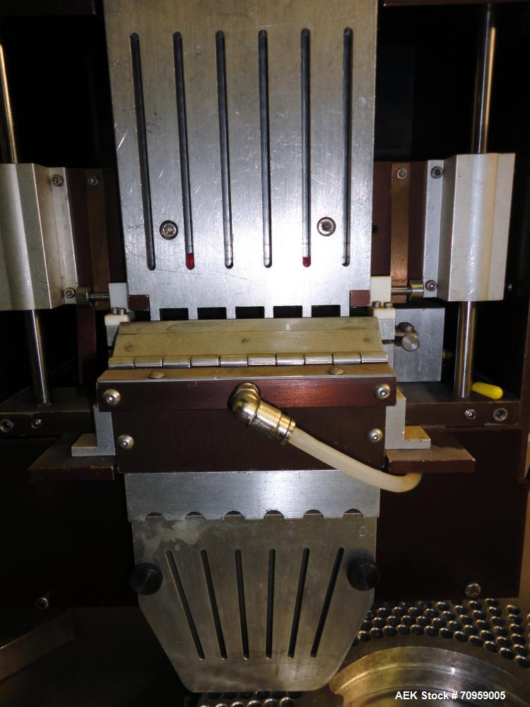 Used Shionogi Qualicaps STI Type 10 Semi-Automatic Capsule Filler. Capable of speeds up to 25,000 capsules per hour. Machine is setup with size 0 Change parts, includes a set of 00 change parts. Has ...