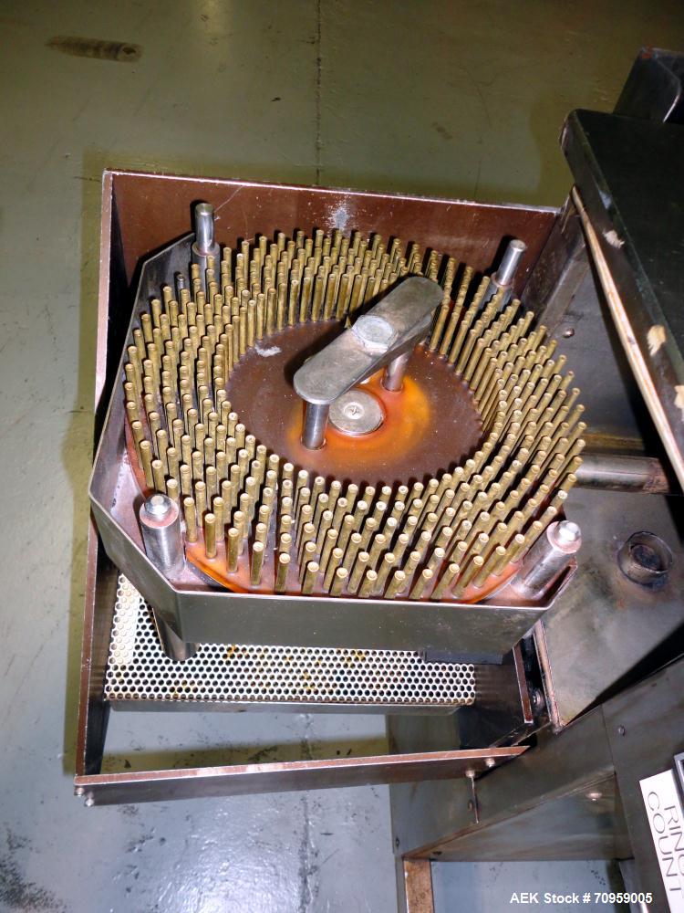 Used Shionogi Qualicaps STI Type 10 Semi-Automatic Capsule Filler. Capable of speeds up to 25,000 capsules per hour. Machine is setup with size 0 Change parts, includes a set of 00 change parts. Has ...