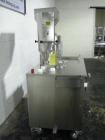Used Capsugel Ultra 8 II Capsule Filler. Stainless steel construction, feed hopper with chute, powder fill station with agitated hopper, on stand, change parts for 00-4 capsule sizes (unit to be supp...