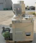 Used Anchor Mark Pharmafill High Speed Capsule Filling Machine, Model CF2. Designed to fill hard gelatin capsules with powder, granules or pellets from capsule sizes 00 to 5, currently set-up on size...