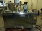 Used Anchor Mark Pharmafill High Speed Capsule Filling Machine, Model CF2. Designed to fill hard gelatin capsules with powder, granules or pellets from capsule sizes 00 to 5, currently set-up on size...