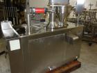 Used Anchor Mark Pharmafill High Speed Capsule Filling Machine, Model CF2. Designed to fill hard gelatin capsules with powder, granules or pellets from capsule sizes 00 to 5, currently set-up on size...