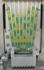 Used Anchor Mark Pharmafill High Speed Capsule Filling Machine, Model CF2. Designed to fill hard gelatin capsules with powder, granules or pellets from capsule sizes 00 to 5, currently set-up on size...