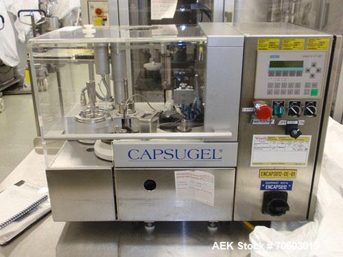 Used Capsugel Liquid Encapsulator, Model CFS1000. Rated approx. 1,000 capsules per hour, serial# 07-02-007, new 2002.