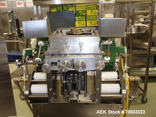Used Vanguard VSG-52B Mini Softgel Encapsulator.  Includes chiller unit, (2) tumble dryers, spare rolls, 150 lt gelatin melting tank and Neslab process chiller, touch screen controls, 480 volt, seria...