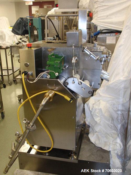 Used Vanguard VSG-52B Mini Softgel Encapsulator.  Includes chiller unit, (2) tumble dryers, spare rolls, 150 lt gelatin melting tank and Neslab process chiller, touch screen controls, 480 volt, seria...