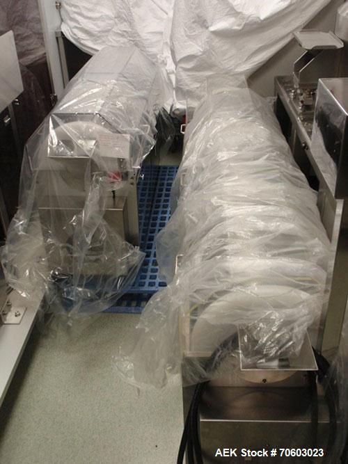 Used Vanguard VSG-52B Mini Softgel Encapsulator.  Includes chiller unit, (2) tumble dryers, spare rolls, 150 lt gelatin melting tank and Neslab process chiller, touch screen controls, 480 volt, seria...