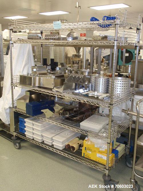 Used Vanguard VSG-52B Mini Softgel Encapsulator.  Includes chiller unit, (2) tumble dryers, spare rolls, 150 lt gelatin melting tank and Neslab process chiller, touch screen controls, 480 volt, seria...