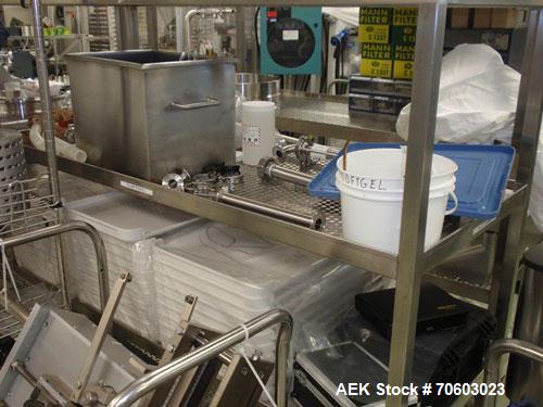 Used Vanguard VSG-52B Mini Softgel Encapsulator.  Includes chiller unit, (2) tumble dryers, spare rolls, 150 lt gelatin melting tank and Neslab process chiller, touch screen controls, 480 volt, seria...