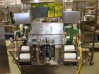 Used Vanguard VSG-52B Mini Softgel Encapsulator.  Includes chiller unit, (2) tumble dryers, spare rolls, 150 lt gelatin melting tank and Neslab process chiller, touch screen controls, 480 volt, seria...