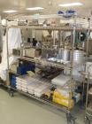 Used Vanguard VSG-52B Mini Softgel Encapsulator.  Includes chiller unit, (2) tumble dryers, spare rolls, 150 lt gelatin melting tank and Neslab process chiller, touch screen controls, 480 volt, seria...