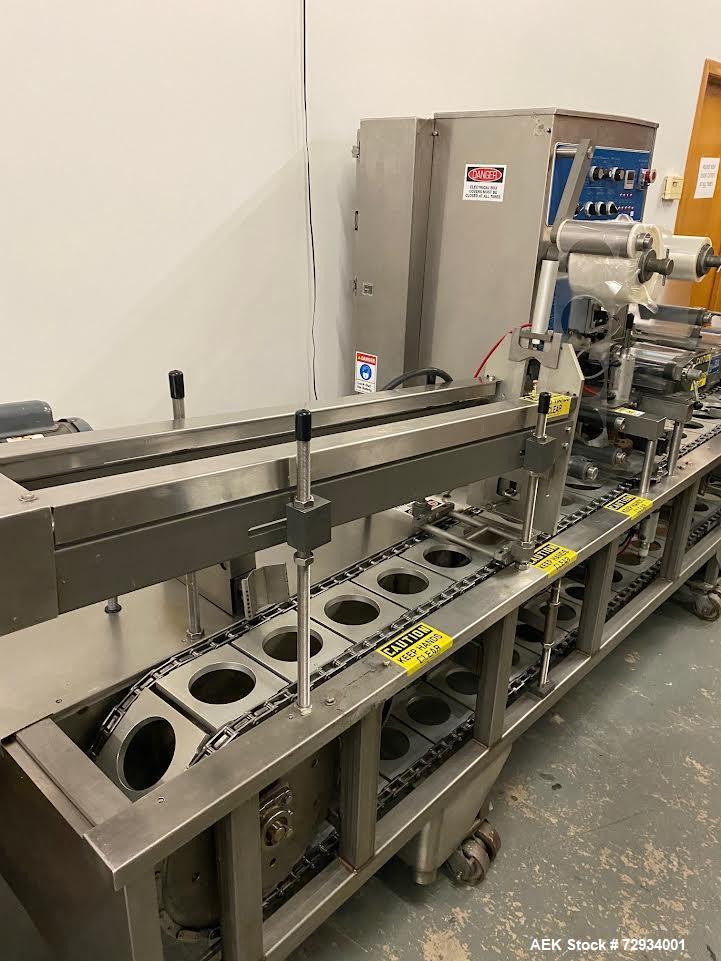Used Holmatic Model PR1 Automatic Inline Cup Filler, Sealer and Overlidder