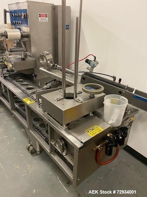 Used Holmatic Model PR1 Automatic Inline Cup Filler, Sealer and Overlidder