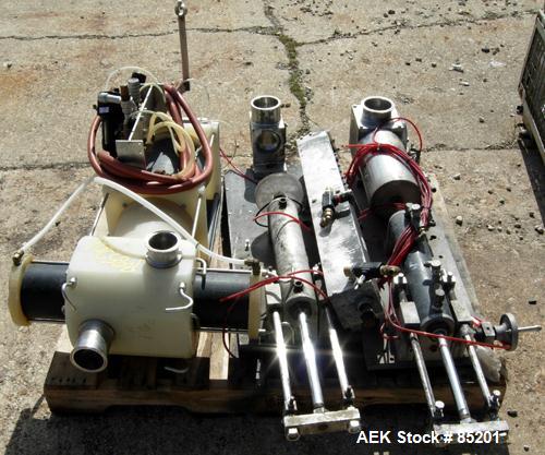 Used Holmatic Inline Single Lane Cup Filler/Lidder/Sealer, Model PR1S. Set up for 5-1/2" diameter cups. Includes cup dropper, filler,film seal (incomplete), and lid placer.Last used in food salads.1/...
