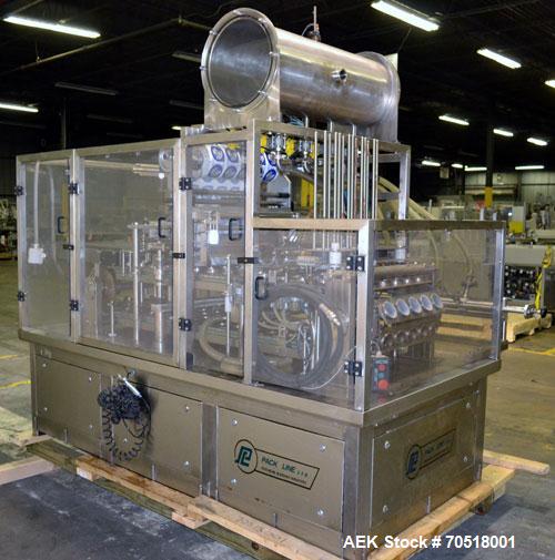 Used Pack Line PXM-5 Cup Filling and Sealing Machine. Unit is a five lane system with speeds rated from 30 to 50 cycles per minute (depending on product and cup size). Currently set up for 3" diamete...