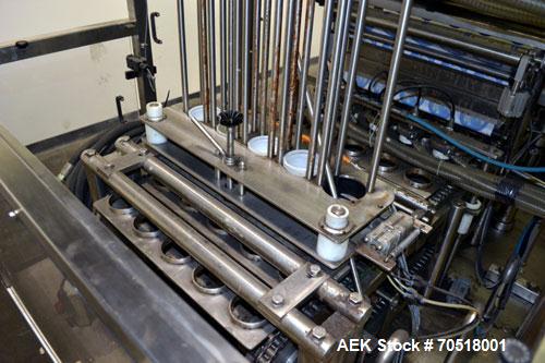 Used Pack Line PXM-5 Cup Filling and Sealing Machine. Unit is a five lane system with speeds rated from 30 to 50 cycles per minute (depending on product and cup size). Currently set up for 3" diamete...