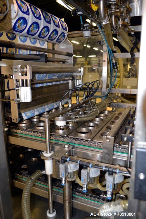 Used Pack Line PXM-5 Cup Filling and Sealing Machine. Unit is a five lane system with speeds rated from 30 to 50 cycles per minute (depending on product and cup size). Currently set up for 3" diamete...