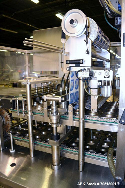 Used Pack Line PXM-5 Cup Filling and Sealing Machine. Unit is a five lane system with speeds rated from 30 to 50 cycles per minute (depending on product and cup size). Currently set up for 3" diamete...
