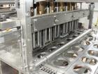Used-AutoProd 6 Lane Cup Filler and Induction Sealer. Stainless steel contact parts. Model FP 1 x 6. Filler has cup dispense...