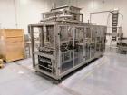 Used Eastsign Four Lane Filling and Capping Machine; Model DCC-4-6000-SOUP