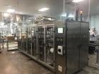 Used Eastsign Four Lane Filling and Capping Machine; Model DCC-4-6000-SOUP