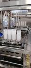 Used Eastsign Four Lane Filling and Capping Machine; Model DCC-4-6000-SOUP